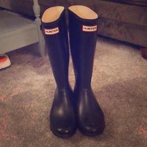Black tall Hunter boots with fleece socks